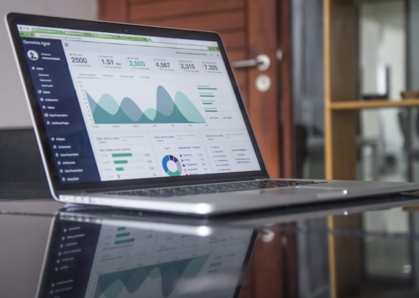 Creative director reviewing advertisement layouts on a large monitor