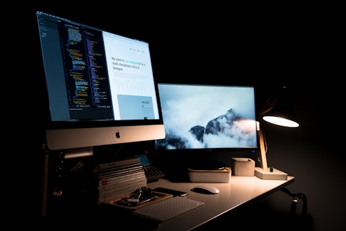 Website copy and page structure being reviewed on a large screen