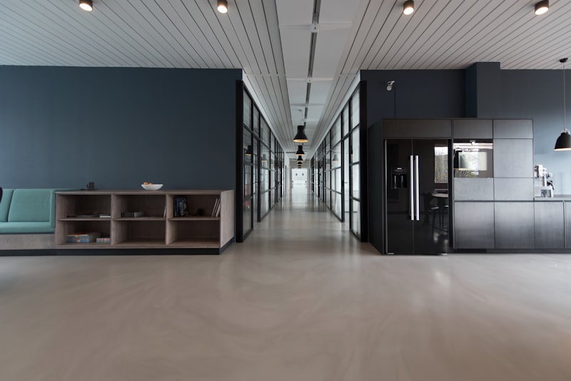 Bright agency workspace with designers collaborating at a shared table